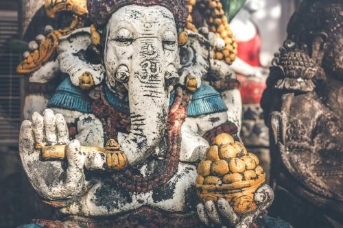 a colorful statue of an elephant god