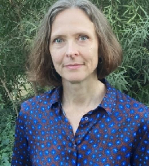 A woman wearing a blue shirt