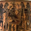 An ancient vase with a painting of figures