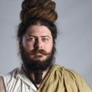 A photo of a man with with facial hair.