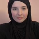 woman in black with head scarf