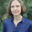 A woman wearing a blue shirt
